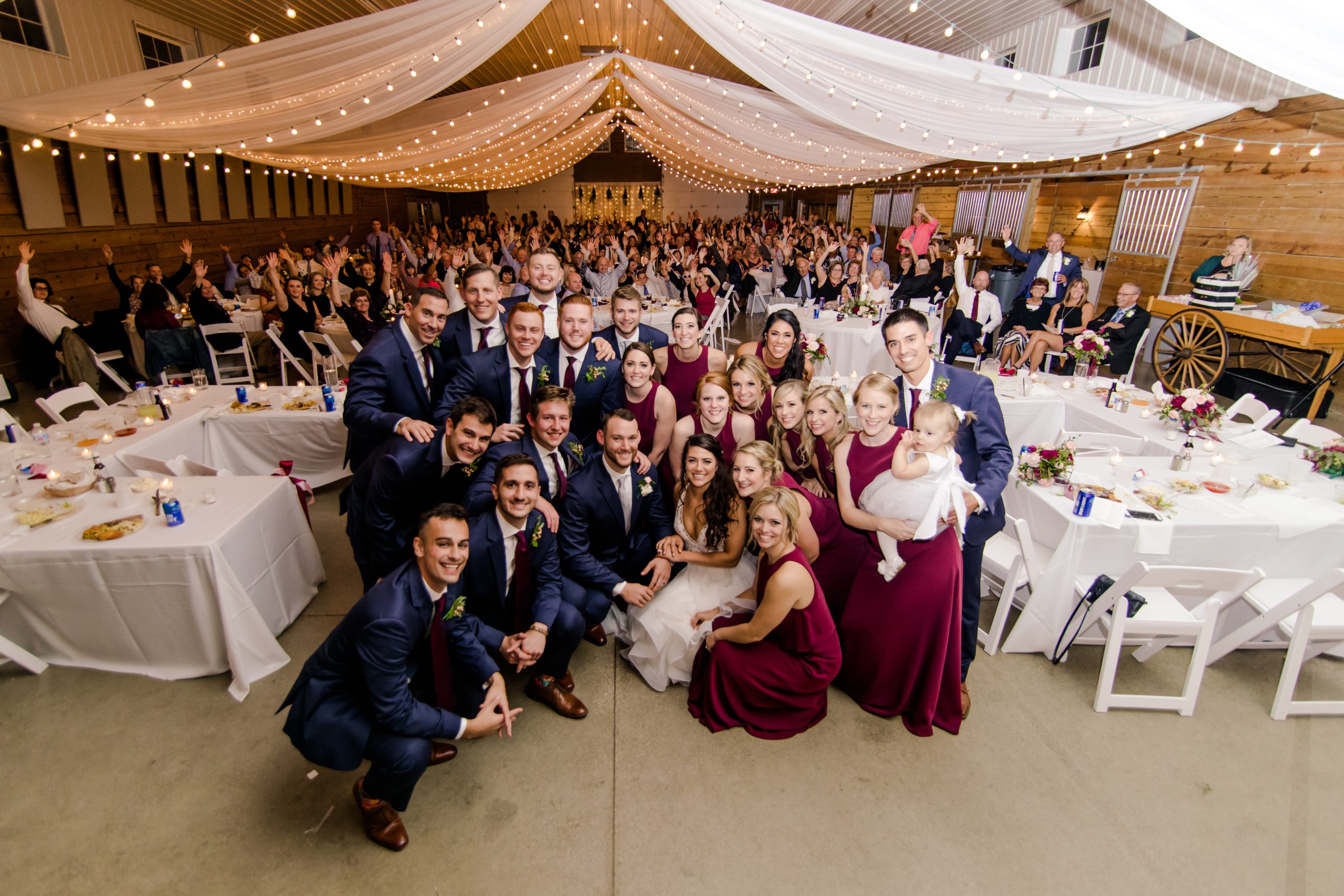 Fun group shot of all wedding guests at The Stables on Obee in Whitehouse, OH