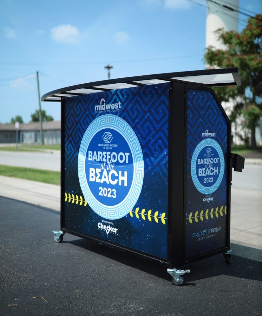 Barefoot at the Beach 2023 portable bar with custom logo bar wrap.