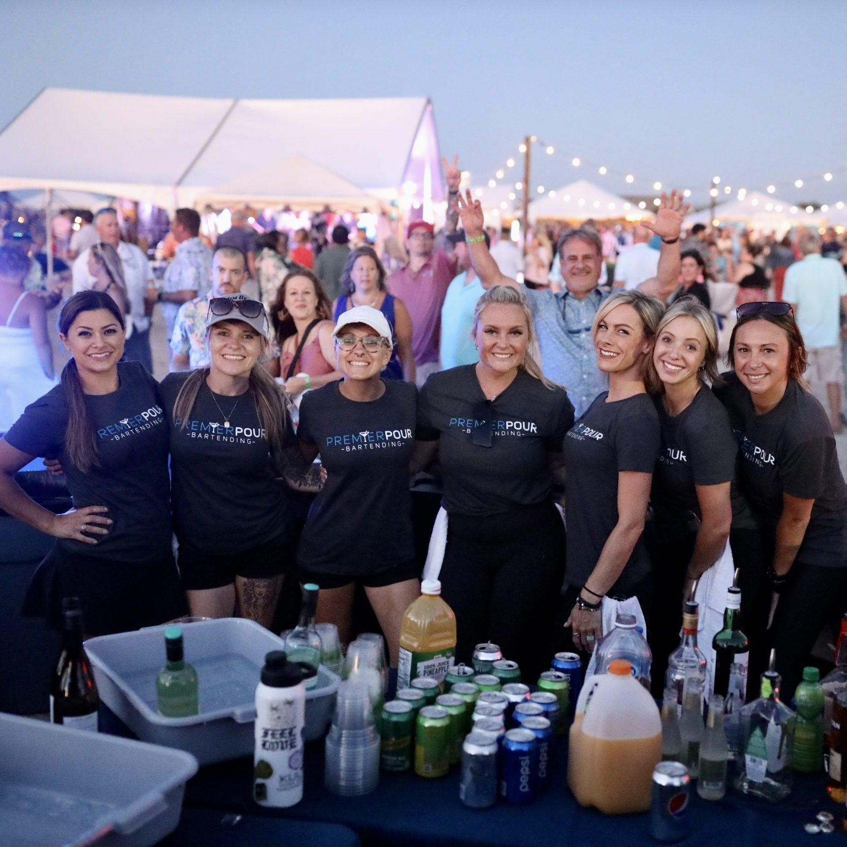 Premier Pour Bartending team photo of bartenders at 2023 Barefoot at the Beach
